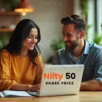 A man and a woman discussing IRFC shares with a laptop open in front of them on a table